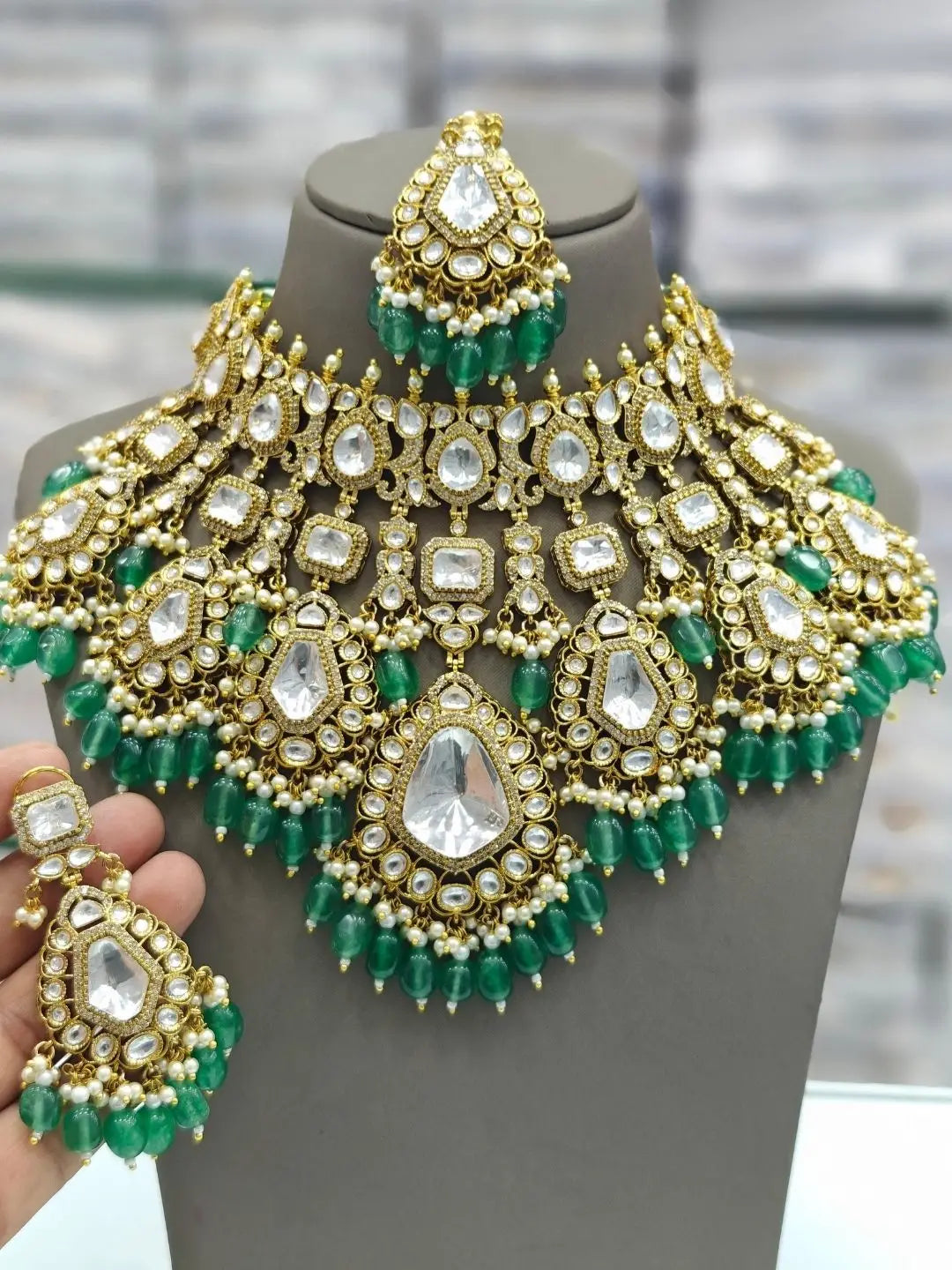 Ishhaara Tear Drop Shaped Emerald Green Kundan Necklace Set