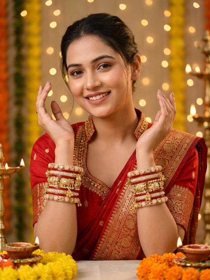 Ishhaara Traditional Gold Kundan Bangles Set - a stack of intricately designed red and gold bangles with elephant motifs - view 7