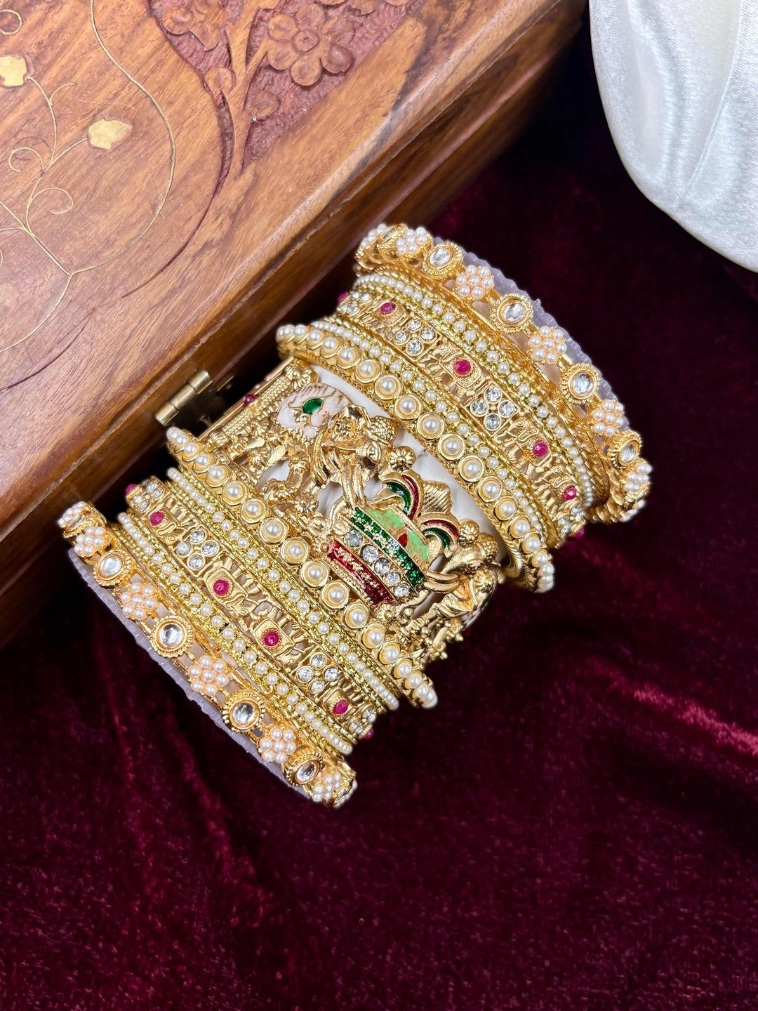 Ishhaara Traditional Indian Gold Bangle Set - a woman wearing traditional Indian gold bangles - view 4