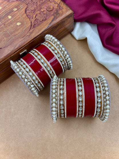 Ishhaara Traditional Indian Red Wedding Lehenga Choli - woman wearing red lehenga choli with gold embroidery - view 2