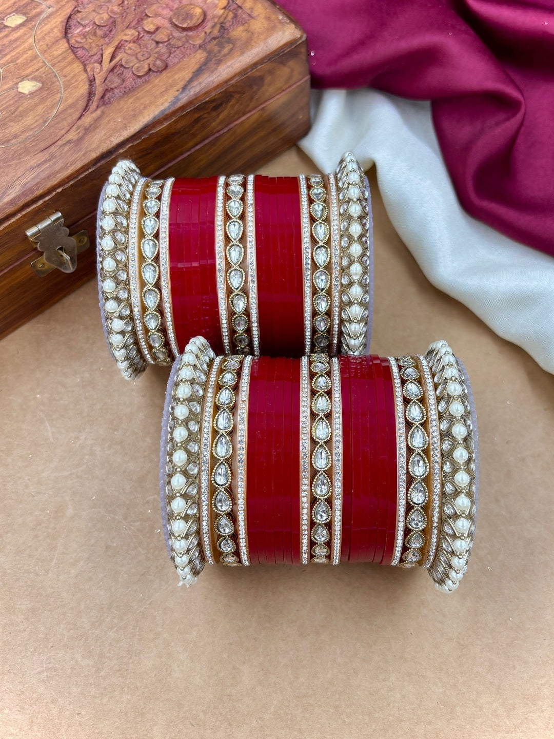 Ishhaara Traditional Indian Red Wedding Lehenga Choli - woman wearing red lehenga choli with gold embroidery - view 3