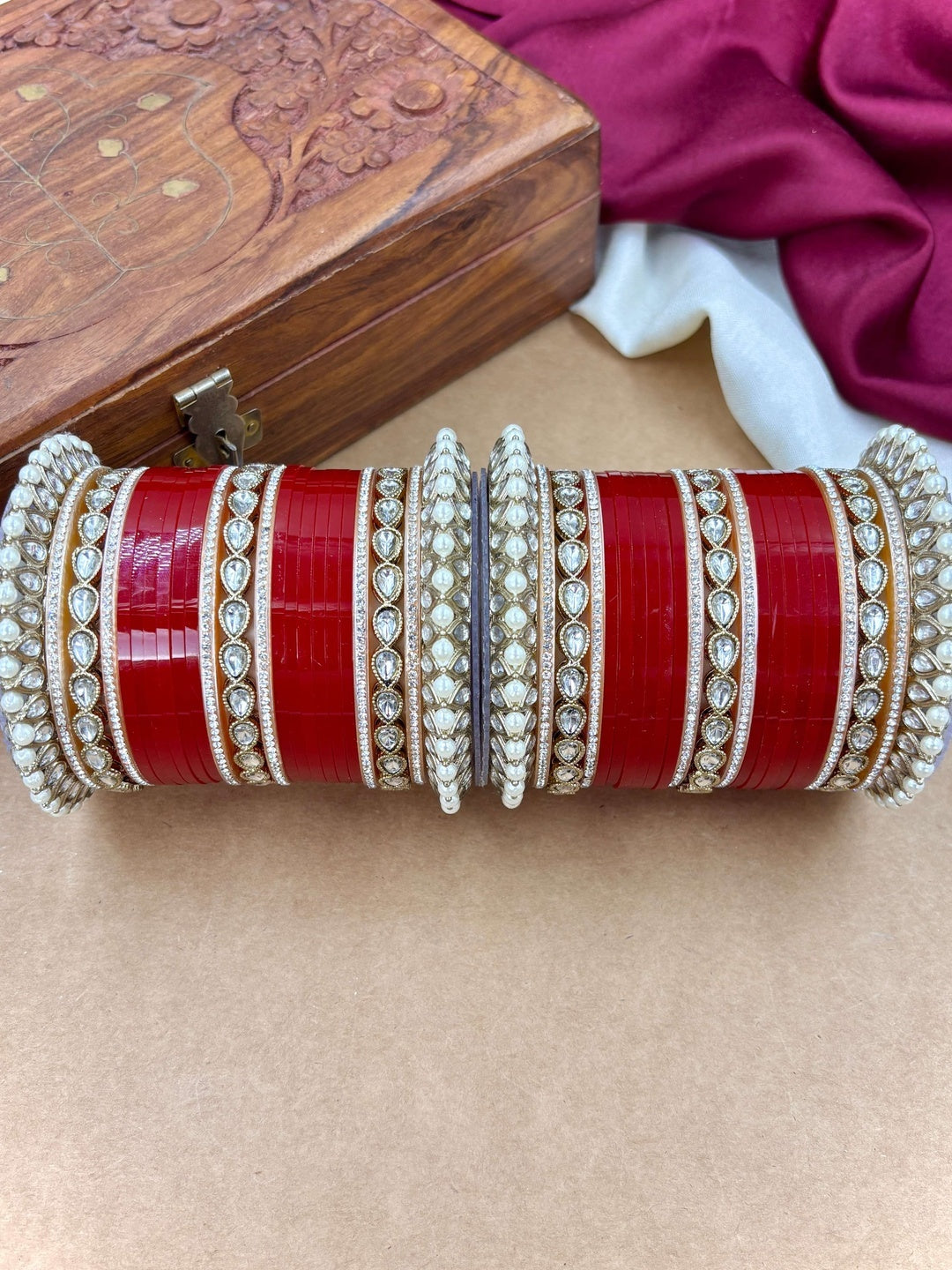 Ishhaara Traditional Indian Red Wedding Lehenga Choli - woman wearing red lehenga choli with gold embroidery - view 4