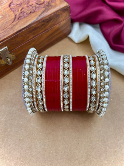 Ishhaara Traditional Indian Red Wedding Lehenga Choli - woman wearing red lehenga choli with gold embroidery - view 5