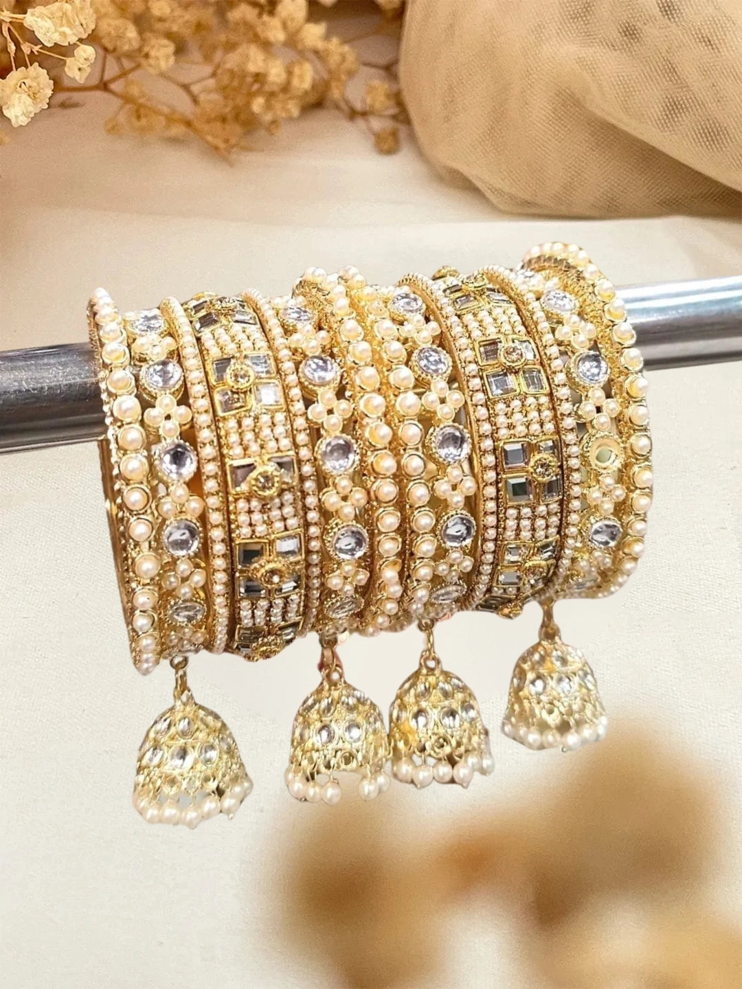 Ishhaara Traditional Pearl And Kundan Studded Bridal Chooda With Jhumka Bangles