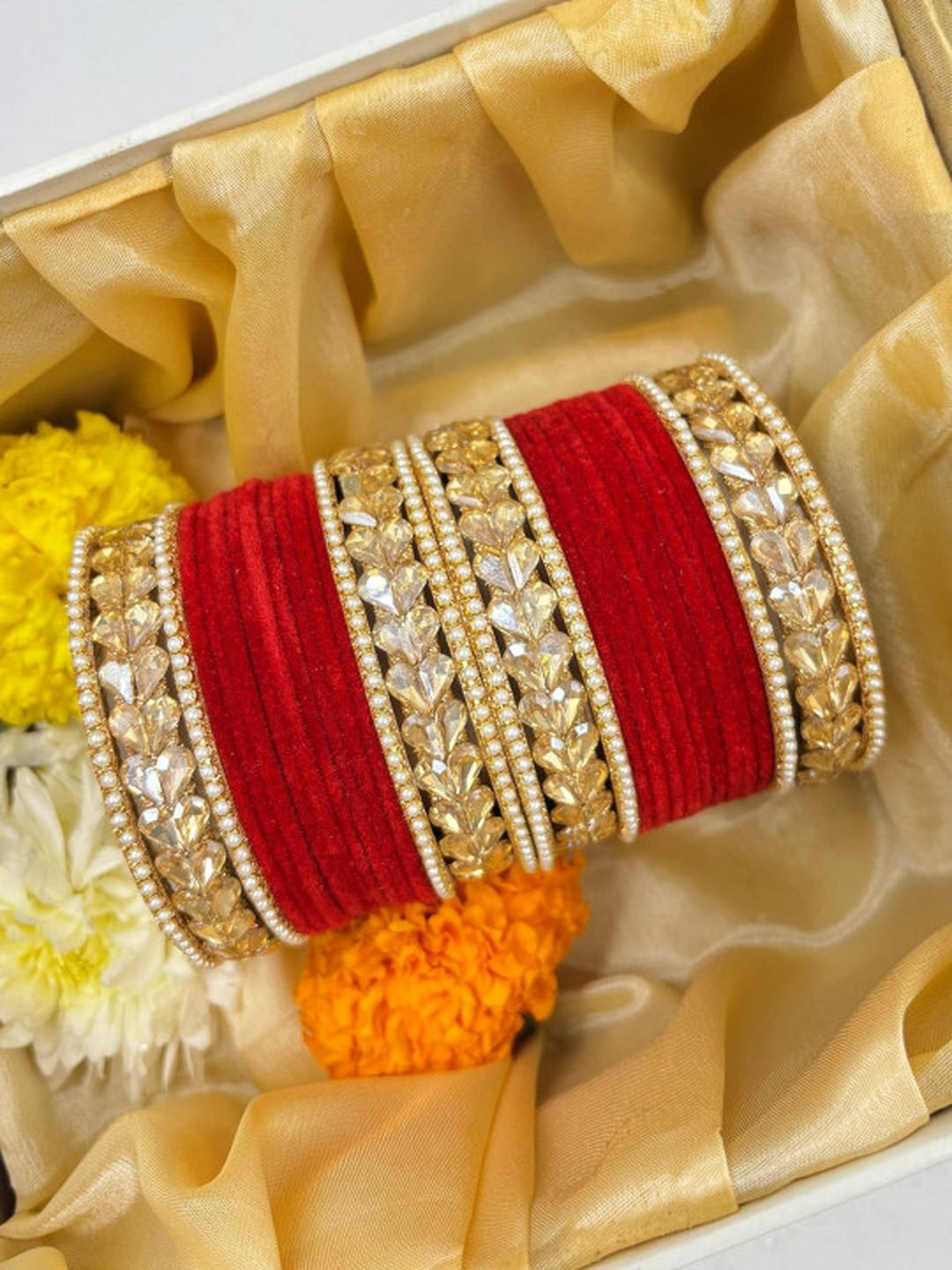 Ishhaara Traditional Red Kundan Bangle Set - a stack of red velvet and gold bangles adorned with Kundan stones - view 3