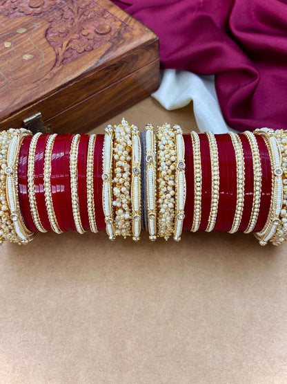 Ishhaara Traditional Red Kundan Bangle Set - a pair of intricately designed red bangles with gold and pearl embellishments - view 2