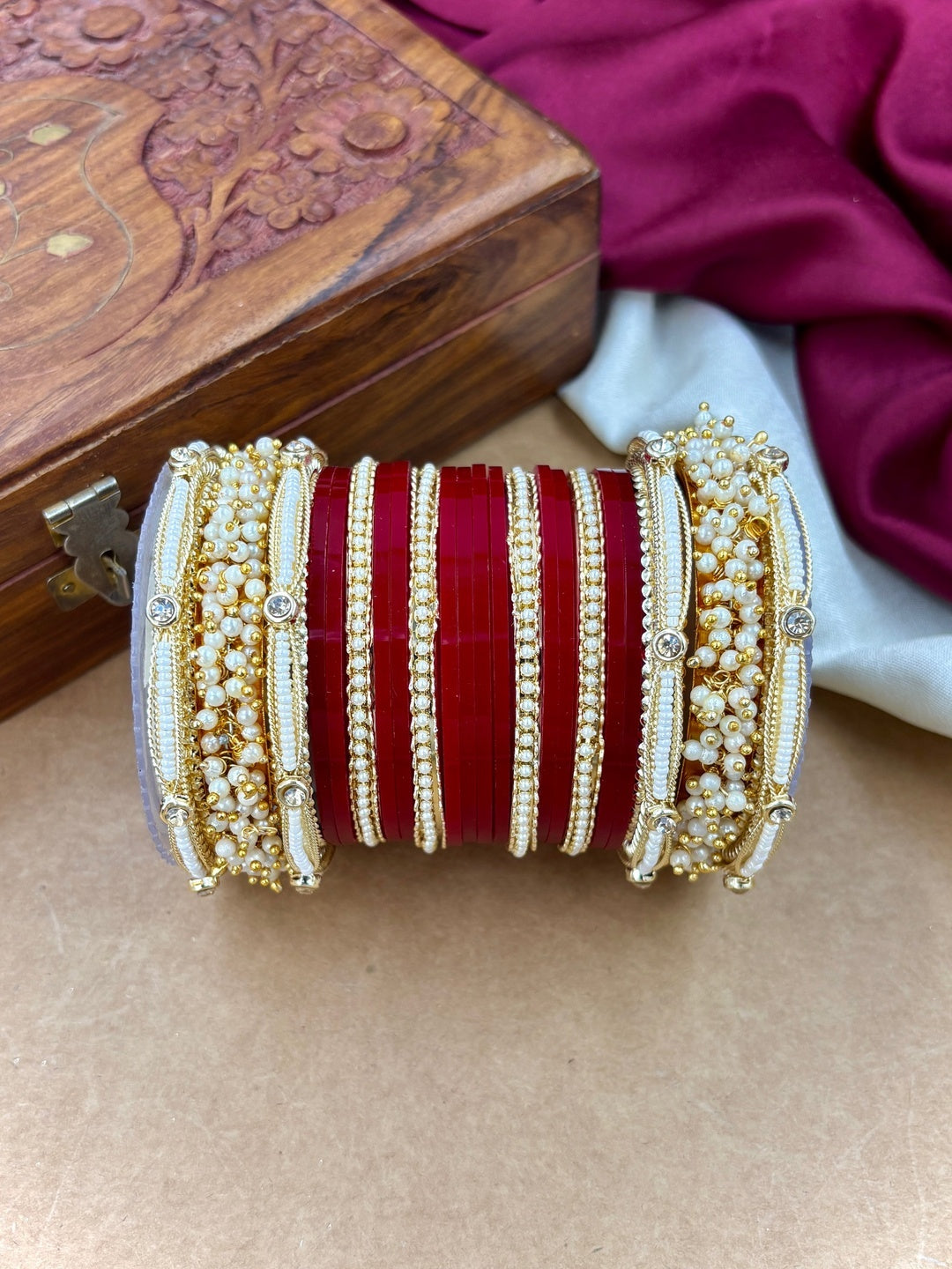 Ishhaara Traditional Red Kundan Bangle Set - a pair of intricately designed red bangles with gold and pearl embellishments - view 3