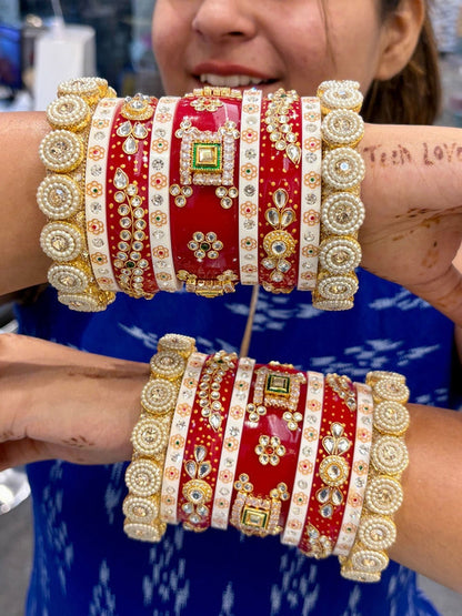 Ishhaara Traditional Red Kundan Bangles - A pair of intricately designed red bangles with gold and white accents - view 4