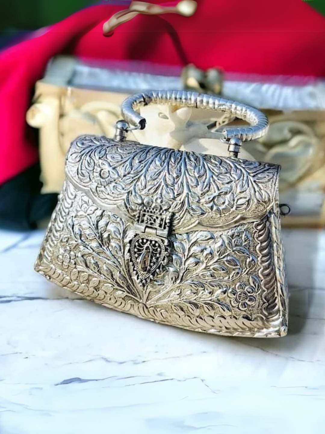 Ishhaara Tricone Shaped Handmade Intricate Designed Metal Purse