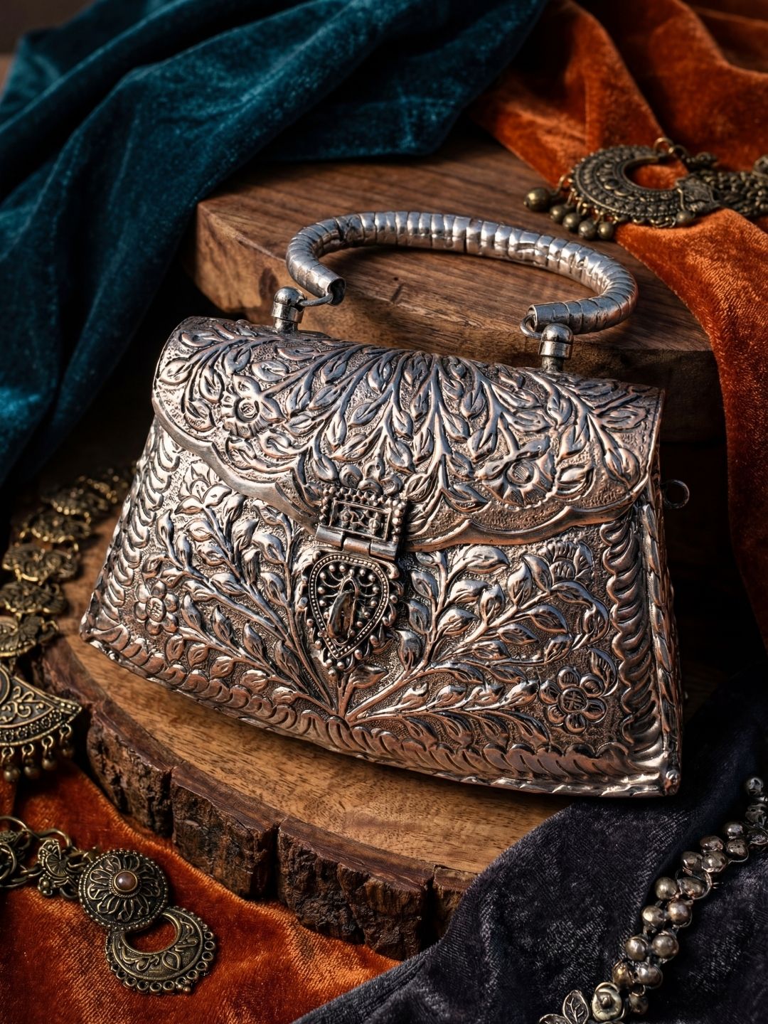 Ishhaara Tricone Shaped Handmade Intricate Designed Metal Purse