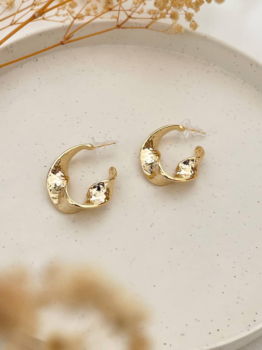 Ishhaara Twisted Hammerd Bold Gold Earrings