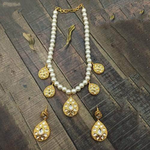Ishhaara White Drop Antique Beads Necklace And Earring Set