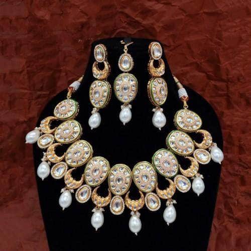 Ishhaara White Oval Multi Chand Necklace Earring And Teeka Set