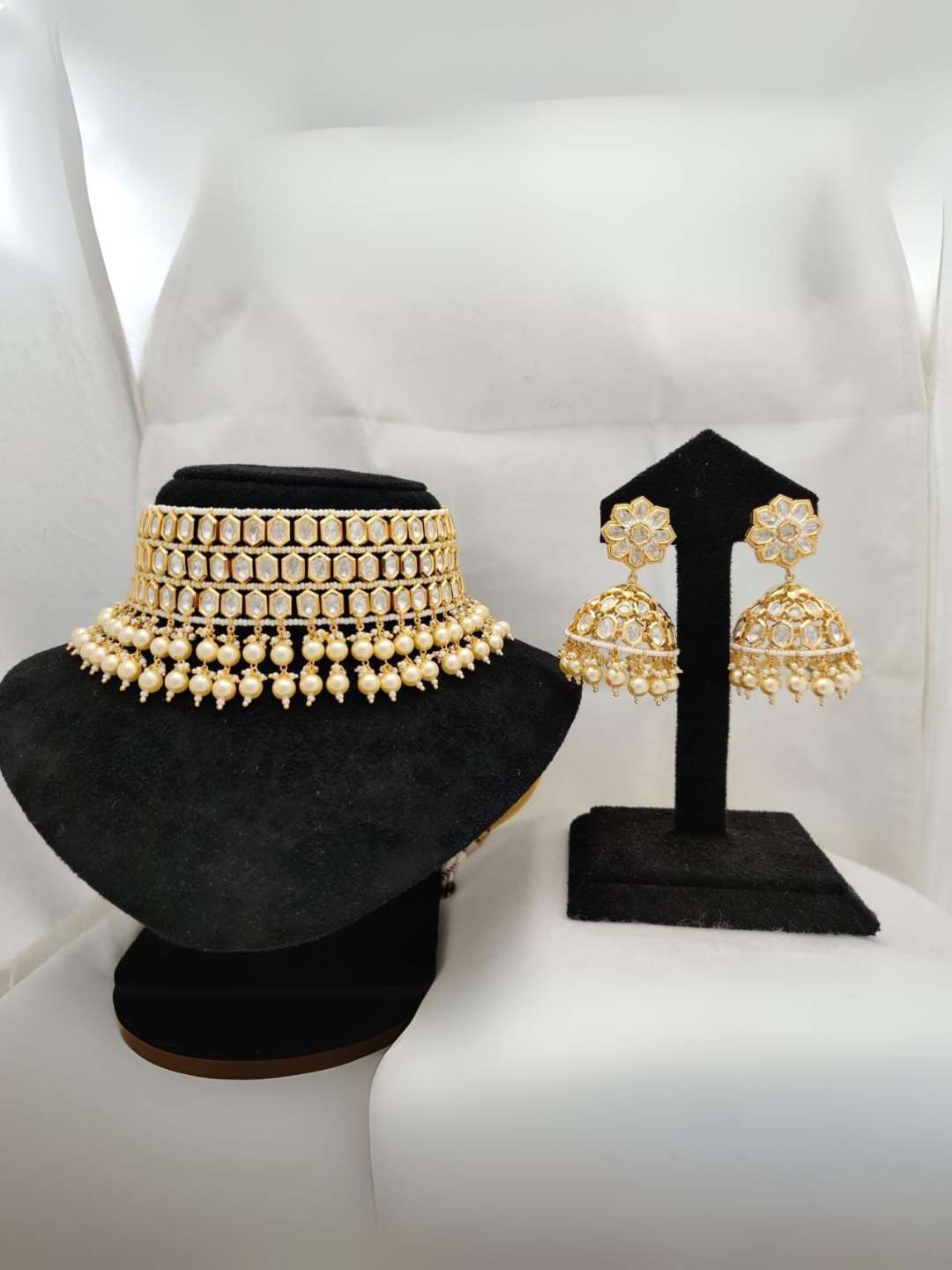 Ishhaara White Pearls Gold Kundan Choker Jhumki Set