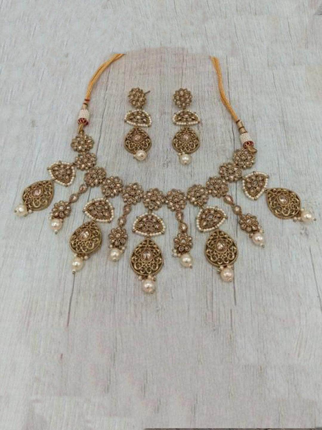 Ishhaara White Reverse AD Triangular Drop Necklace And Earring Set