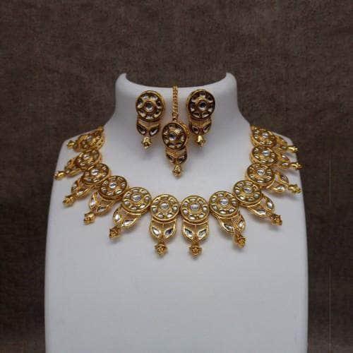 Ishhaara White Round Cut Leaf Kundan Necklace And Earring Set