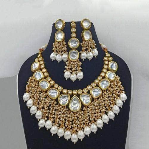 Ishhaara Small And Big Kundan Tassel Necklace Earring And Teeka Set