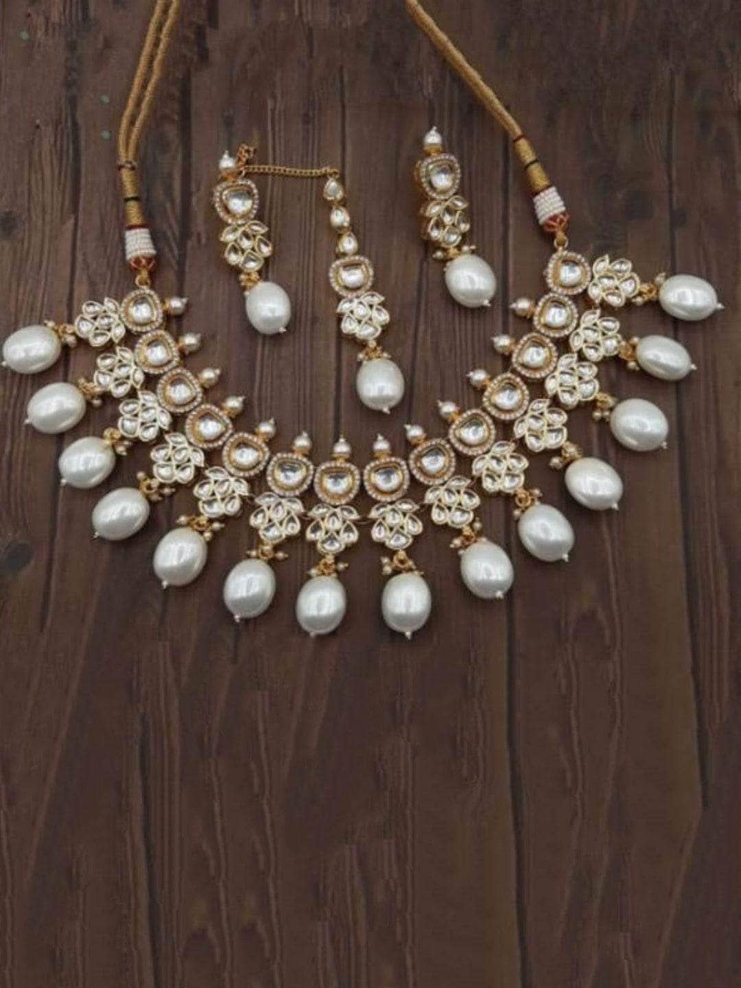 Ishhaara White Stephanie Timmins in AD Kundan Drop Pearls Necklace Set