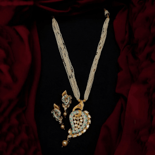 Ishhaara White White Beads With Kundan Paisley Pendant Necklace Set
