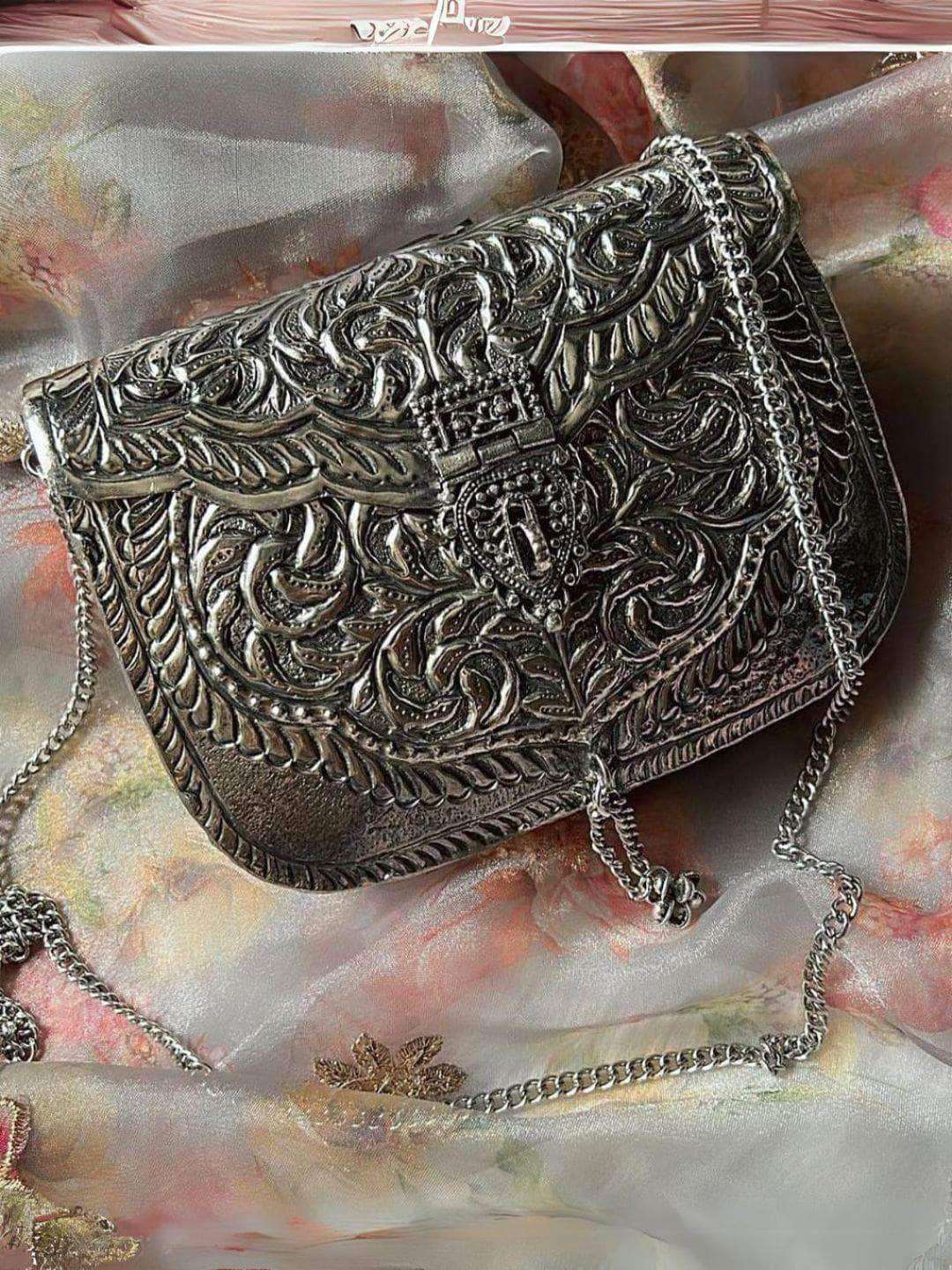 Ishhaara Women Silver Brass Metal Bag