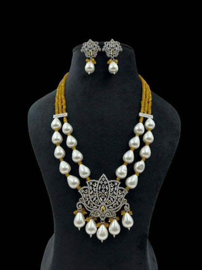 Ishhaara Yellow Lotus Shaped Pendant Studded Long Necklace